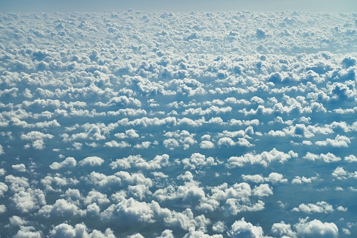 An aerial shot of the sea of clouds and the blue sky