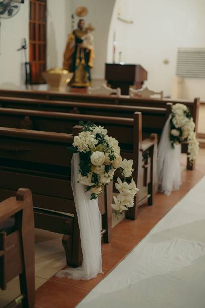 istock Vertical shot of a church interior decorated for a wedding 1445920172