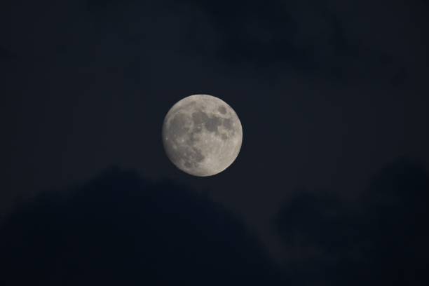 istock Mysterious full moon in the dark night sky 1445920714