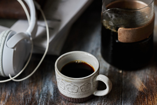 relaxing coffee break: coffee cup and headphone