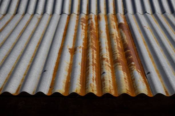 istock Closeup of a rusty steel roofing sheet texture in daylight 1445924994
