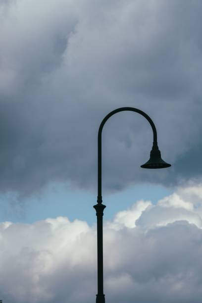 istock Street lamp on cloudy sky background 1445925719