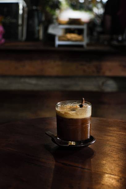 istock Vertical shot of a cinnamon coffee mocktail on a translucent glass 1445925759