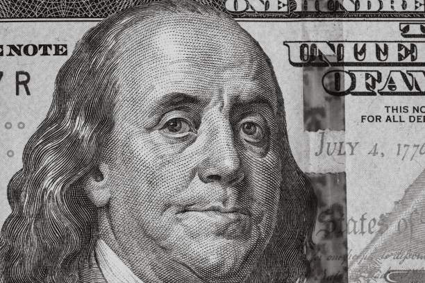 istock Grayscale closeup of a USD banknote - perfect for background 1445928562