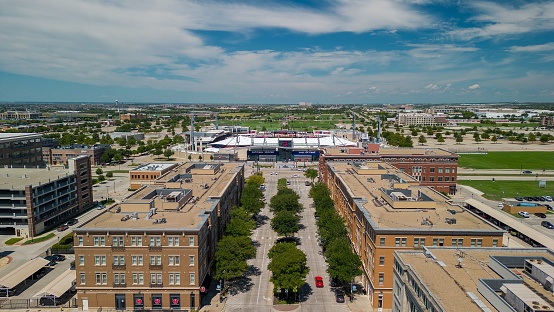 Austin, United States - September 29, 2022:  Aerial view of the campus of the University of Texas at Austin, a public university and the home of the Texas Longhorns including the DKR Texas Memorial Stadium, the Moody Center, UFCU Disch-Falk Field, the the University of Texas Tower shot from an altitude of about 1200 feet during a helicopter photo flight.