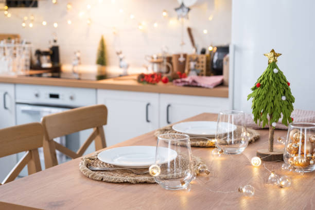 istock Festive Christmas decor and mess in the light kitchen, festive breakfast, white scandi interior. New Year, mood, cozy home 1445929144