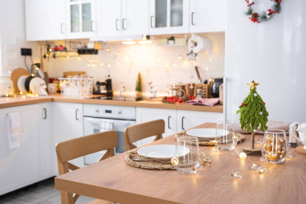 istock Festive Christmas decor and mess in the light kitchen, festive breakfast, white scandi interior. New Year, mood, cozy home 1445929151