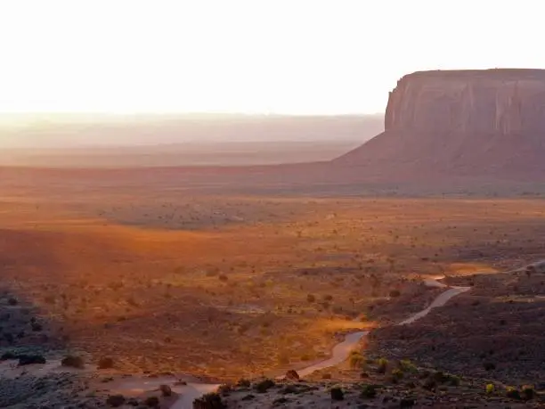 The red-sand Monument Valley on the Arizona-Utah border at sunset