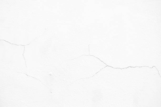 istock Crack Lines on White Stucco Wall Texture for Background. 1445932134