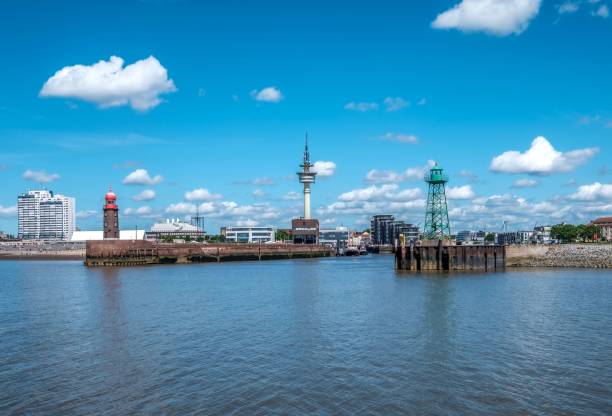 istock Scenic view of a sea against a harbor under a cloudy blue sky 1445934544
