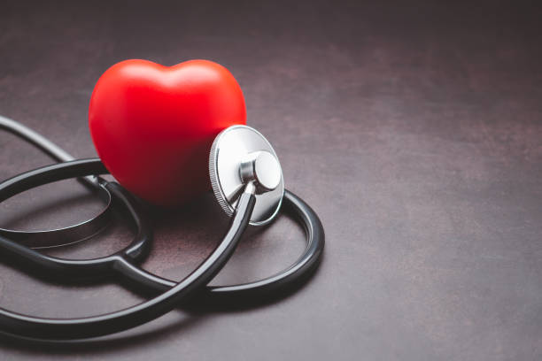 istock A stethoscope and red heart on vintage background 1445935314