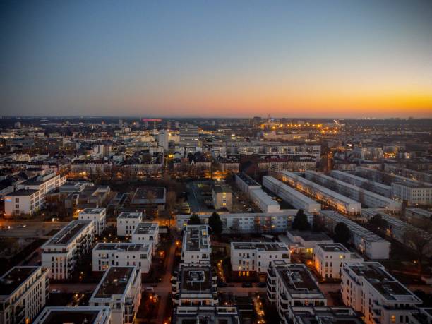 istock High angle view of modern buildings during dark night 1445935376