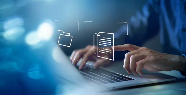 istock Document Management System DMS and Software for archiving searching and managing files online document database. Consultant information technology setup DMS technology 1445938076