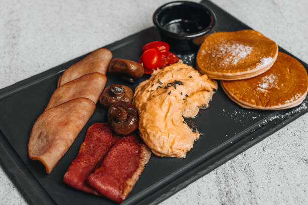 Free Stock Photo of Black Plate With Pancakes and Scrambled Eggs ...