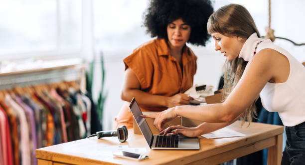 istock Thrift store owners preparing online orders fo shipping 1445944380