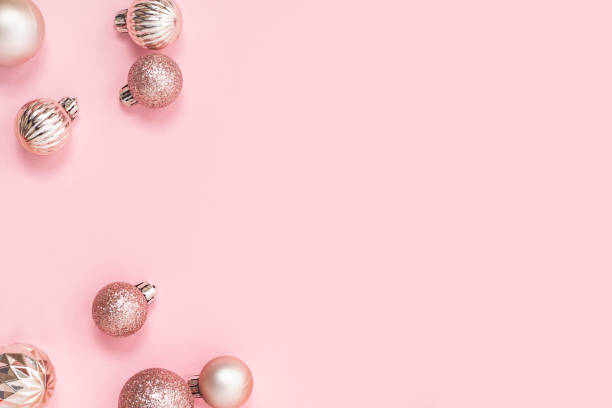 istock Decorative pink Christmas balls on a pink background. Top view, flat lay. 1445949050