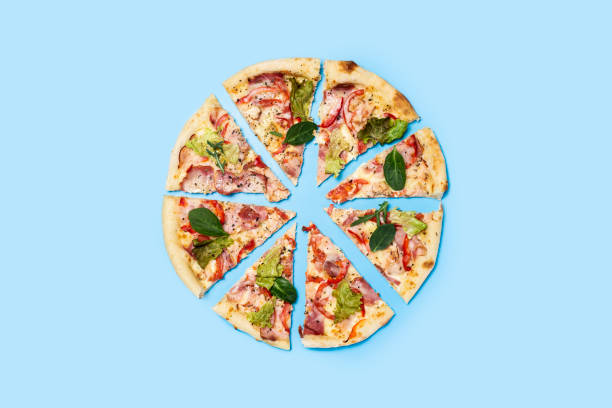 istock cut pizza fresh hot on a blue background. Top view, flat lay 1445949346