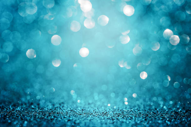 istock glitter vintage lights background. black and blue defocused christmas background 1445949467