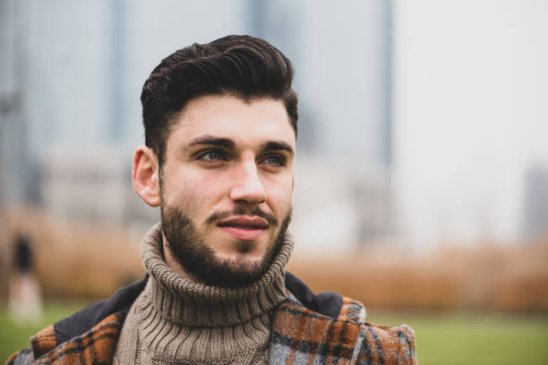 istock Young man portrait outside, country style 1445950253
