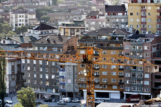 istock Crain on construction site  against old buildings 1445950372