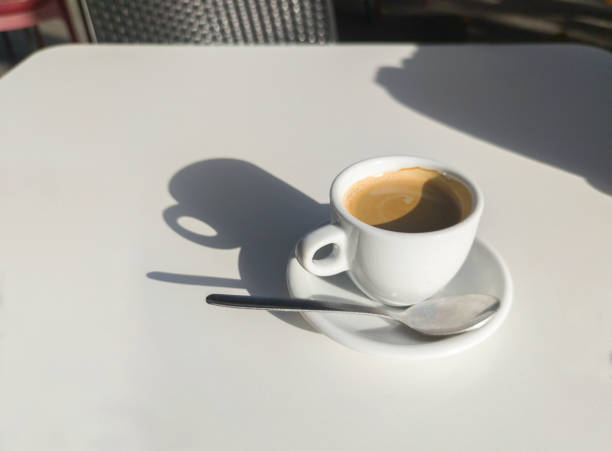 istock Coffee cup over terrace table a sunny day 1445950374
