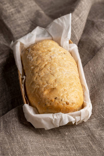 istock square loaf of fresh soft bread on a linen cloth 1445953248