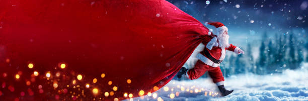 istock Santa Claus Running On Snow In Winter Landscape 1445954391