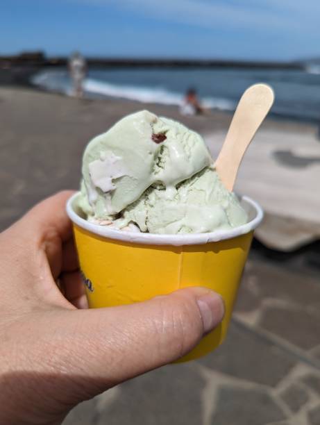 istock Pistachio ice cream in paper cups 1445958928