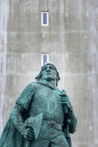 statue of Leif Eriksson in front of the Hallgrimskirkja Church in Reykjavik. The statue, made by the American sculptor Alexander Stirling Calder (1870-1945) in 1930, is a tribute to the explorer Leif Eriksson and his discovery of America. This is not a statue erected in front of the church, but the church was built behind Eriksson; Reykjavik, Iceland