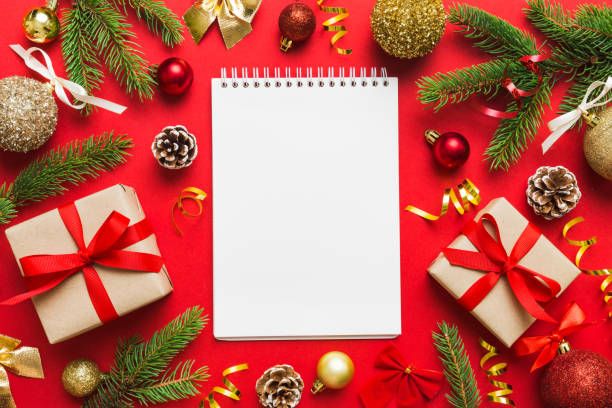istock Christmas blank greeting card mock-up scene. Creative layout made of Christmas tree branches and paper card note. Flat lay. Nature New Year concept 1445970243
