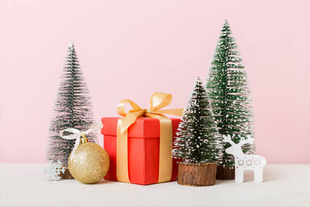 istock Christmas composition. craft Gift box, small tree, branches and craft DIY decorations on white background. New year concept. Christmas home decoration Flat lay, top view, copy space 1445970321