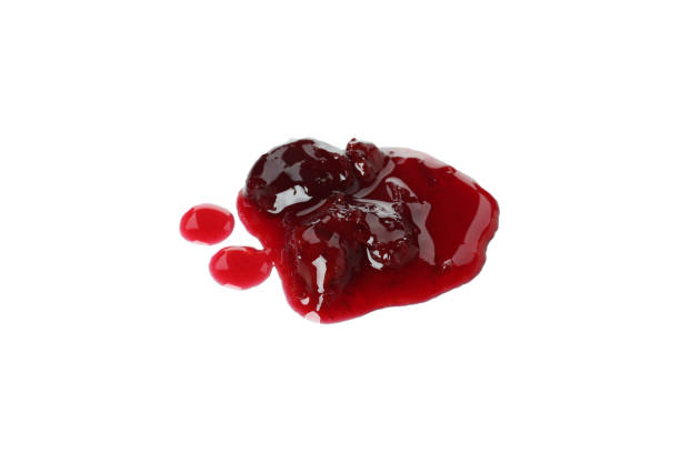 istock Tasty cherry jam isolated on white background 1445970905