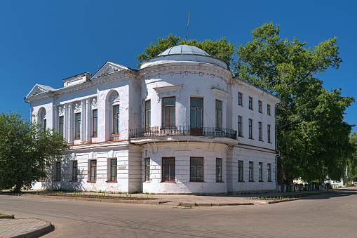 Veliky Ustyug, Russia - July 4, 2010: Tchebaevsky Mansion or Alenyov-Popov Mansion, a historical building of the first quarter of the 19th century.