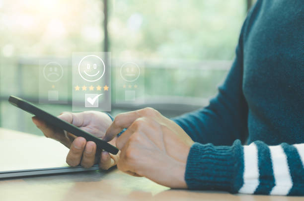 istock Customer review satisfaction questionnaire feedback survey concept, client give a rating to service experience on the online application, quality of ranking of the business, customer service, 1445978043