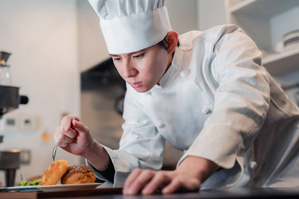 istock A pastry chef who creates sweets with special attention to detail 1445979014