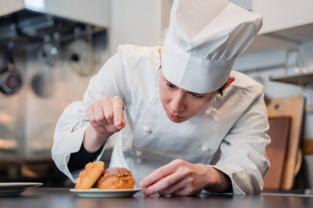 istock A pastry chef who creates sweets with special attention to detail 1445979037