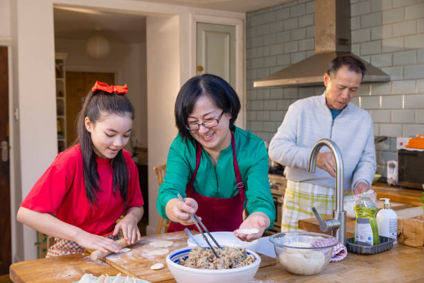 istock Making Food Together as a Family 1445980080