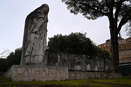 Rome, Italy, november 22, 2022 : Saint Catherine of Siena monument created by Francesco Messina in Rome