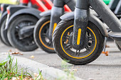 Electric Scooters parking, wheels close-up
