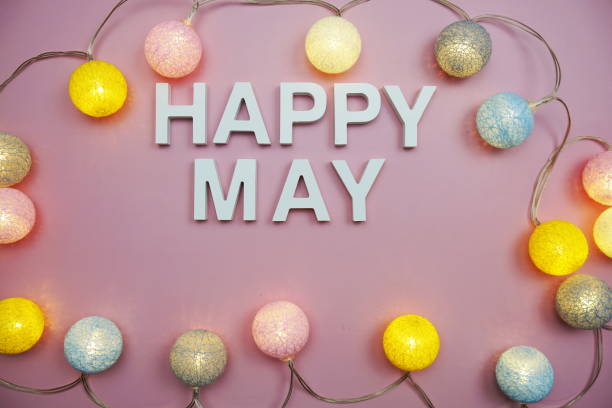 istock Happy May alphabet letters on pink background 1445988637