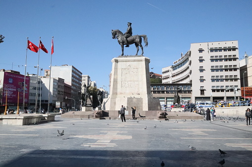 Victory Monument or Zafer Aniti the statue of Mustafa Kemal Ataturk, in the Ulus square in Ankara. tourist destinations. With the visitors and the pigeons