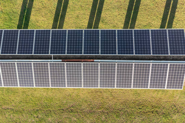 istock Aerial view of solar panels on sidewalk roof 1445991200