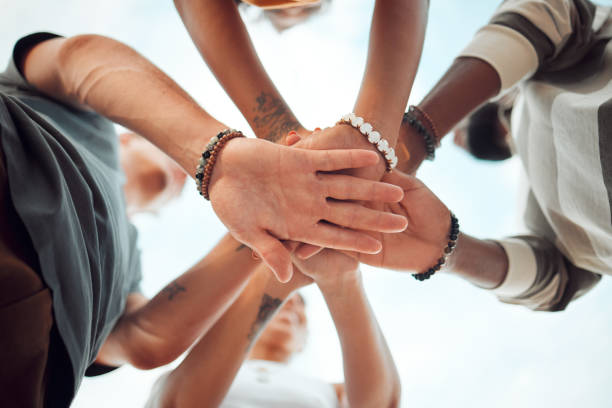 istock Support, community and teamwork with hands of friends from bottom for goals, vision or networking together. Motivation, collaboration and growth with circle of people for mindset, mission or contact 1445991284
