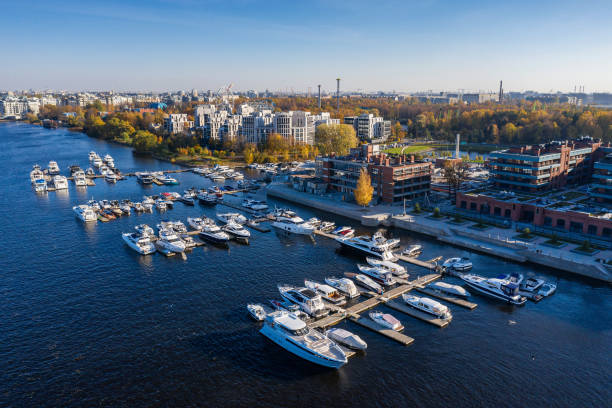 St. Petersburg, the Srednyaya Nevka River, fashionable buildings and yacht parking. Aerial view. stock photo