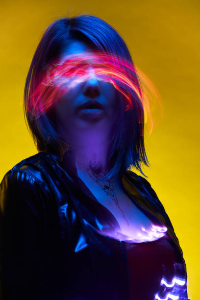istock Woman is using augmented reality headset. Concept of virtual, augmented and extended reality. 1445992730