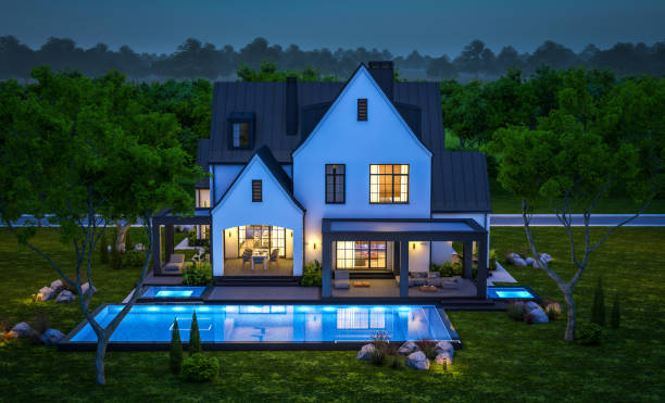 istock 3d rendering of white and black modern Tudor house in night 1445998874
