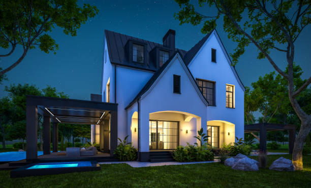 istock 3d rendering of white and black modern Tudor house in night 1445998878
