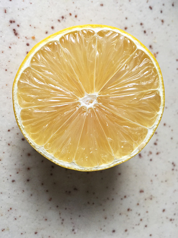 High angle view close up half of lemon slice