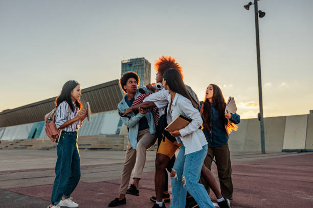 istock College students brawl after school. 1445999661