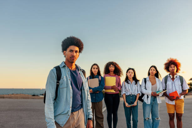 African American student with friends. stock photo